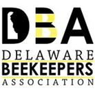 First-party Delaware Beekeepers Association logo: DBA letters in black and yellow with the outline of Delaware, above the club name.