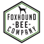 Foxhound Bee Company hexagonal wordmark with a foxhound silhouette on a black field and a green border.